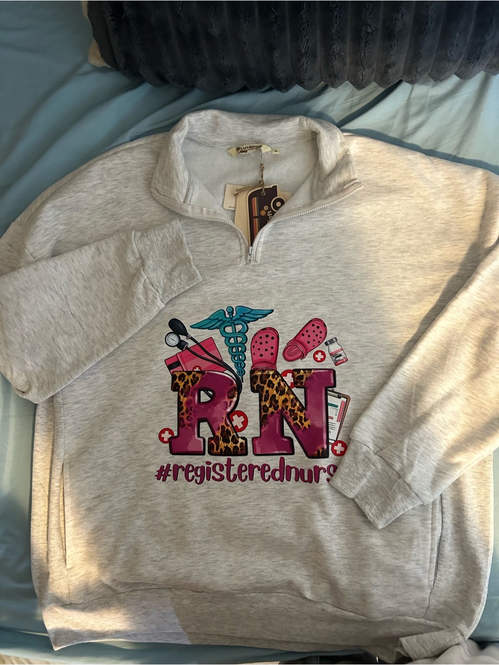 RN graphic 3/4 zip up
